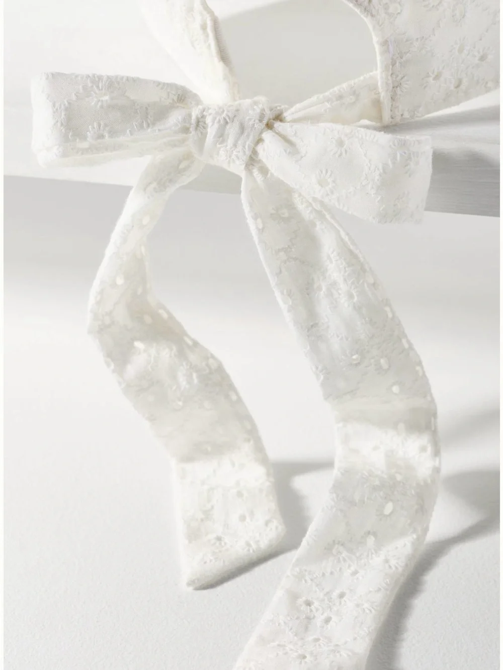 Anthropologie Eyelet Baseball Cap with Bow Back in White. One size. Brand new!